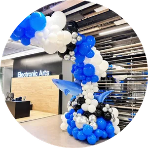 Balloon backdrop with brand colors for corporate event setup in Orlando