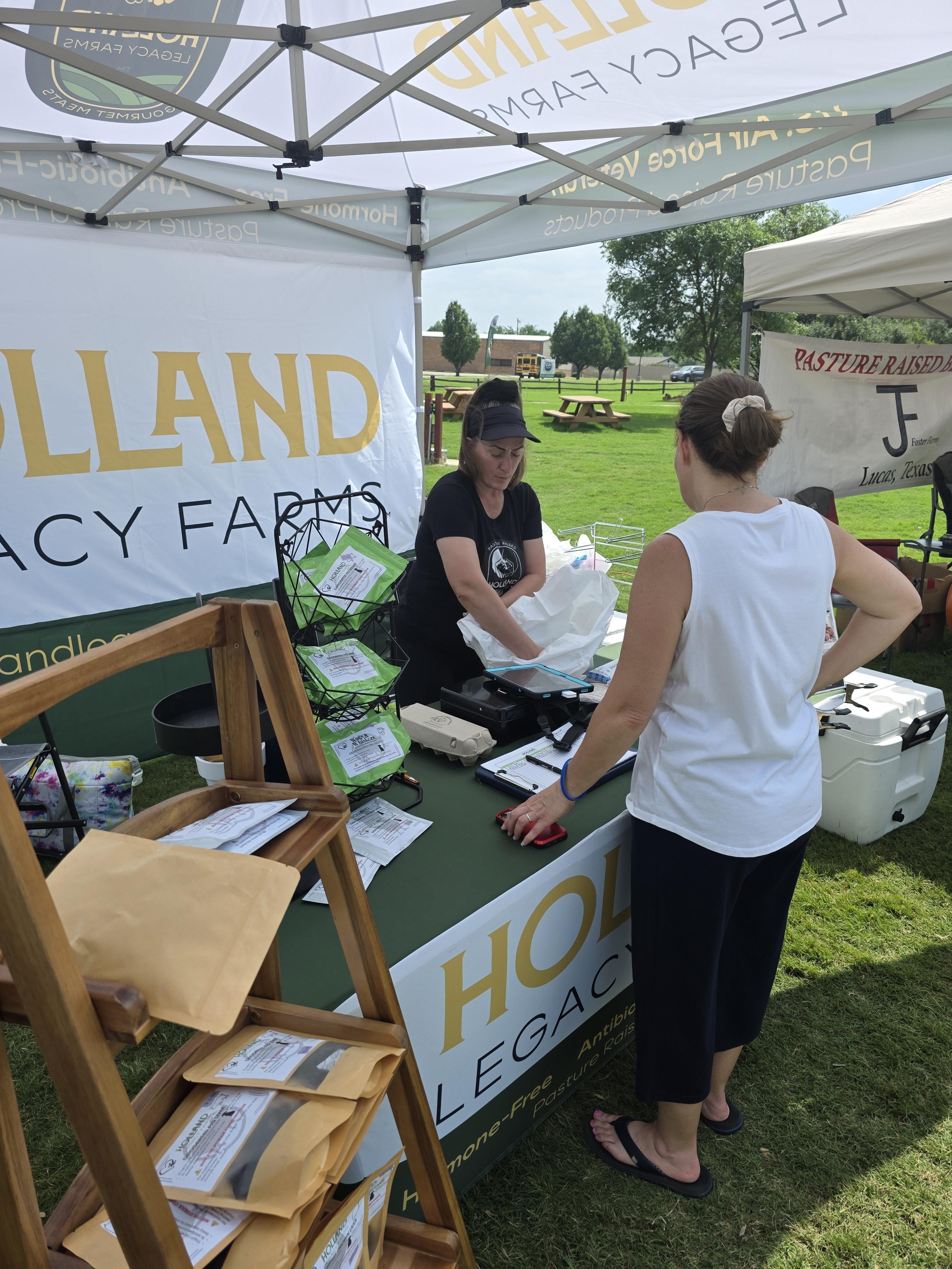 Holland Legacy Farms booth at local North Texas farmers market
