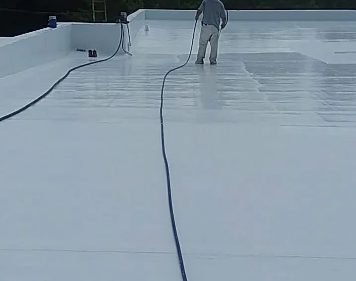 Large flat-roof building with new white PVC membrane installed