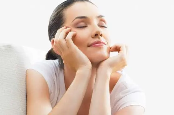 Relaxed woman experiencing calmness, aligning with Slender Spirit's mindfulness and wellness techniques.