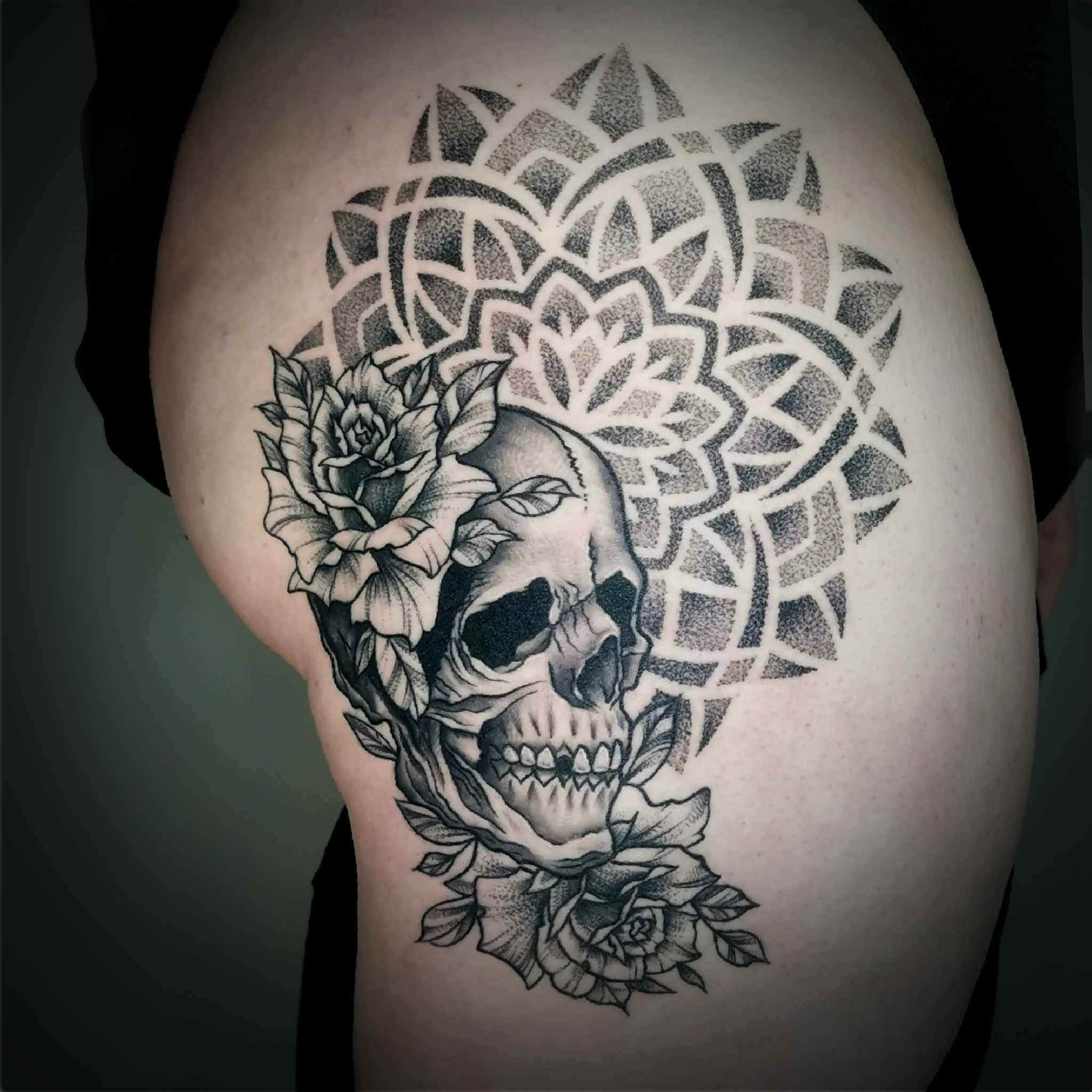 person in blue denim shorts and white nike sneakers standing on gray concrete floor