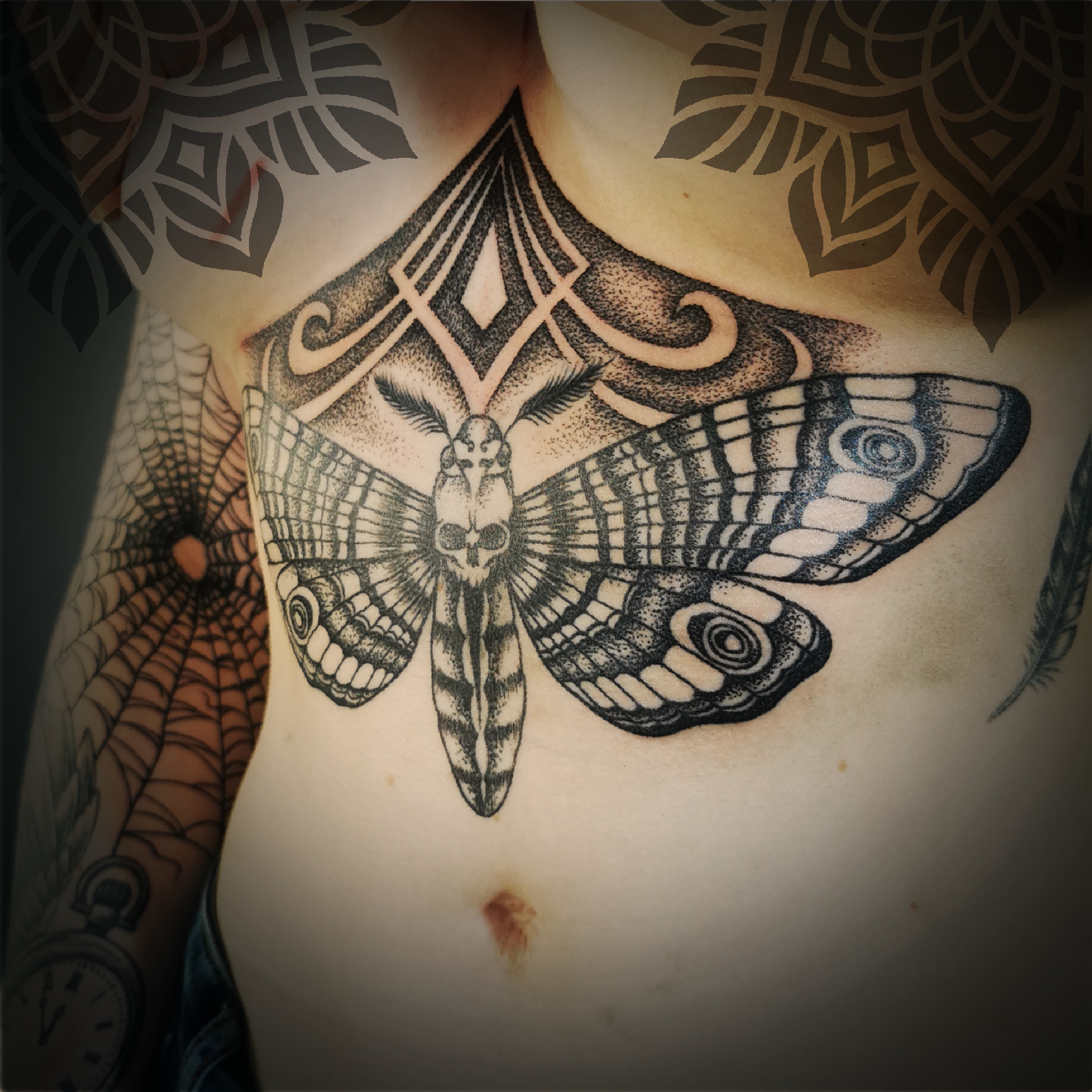 person with tattoo on right arm