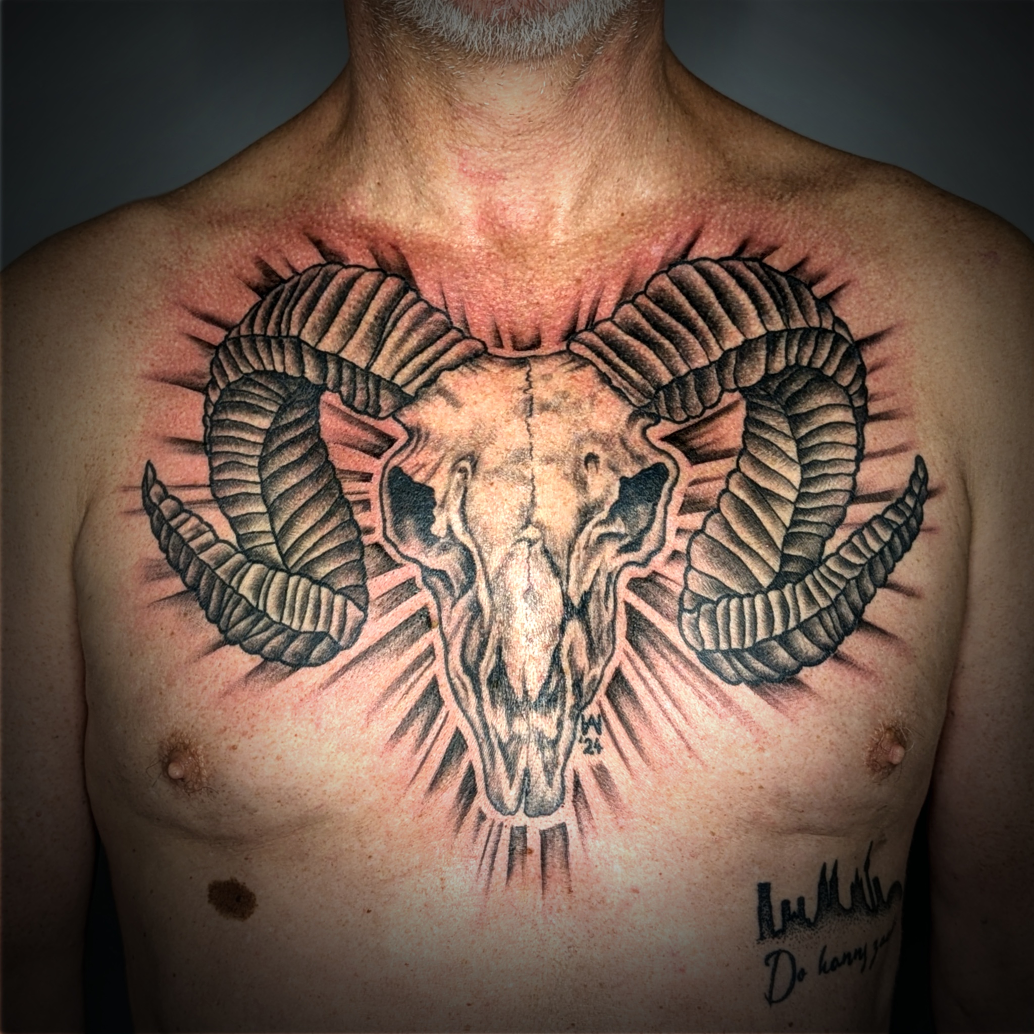 A sign that is on the side of a building