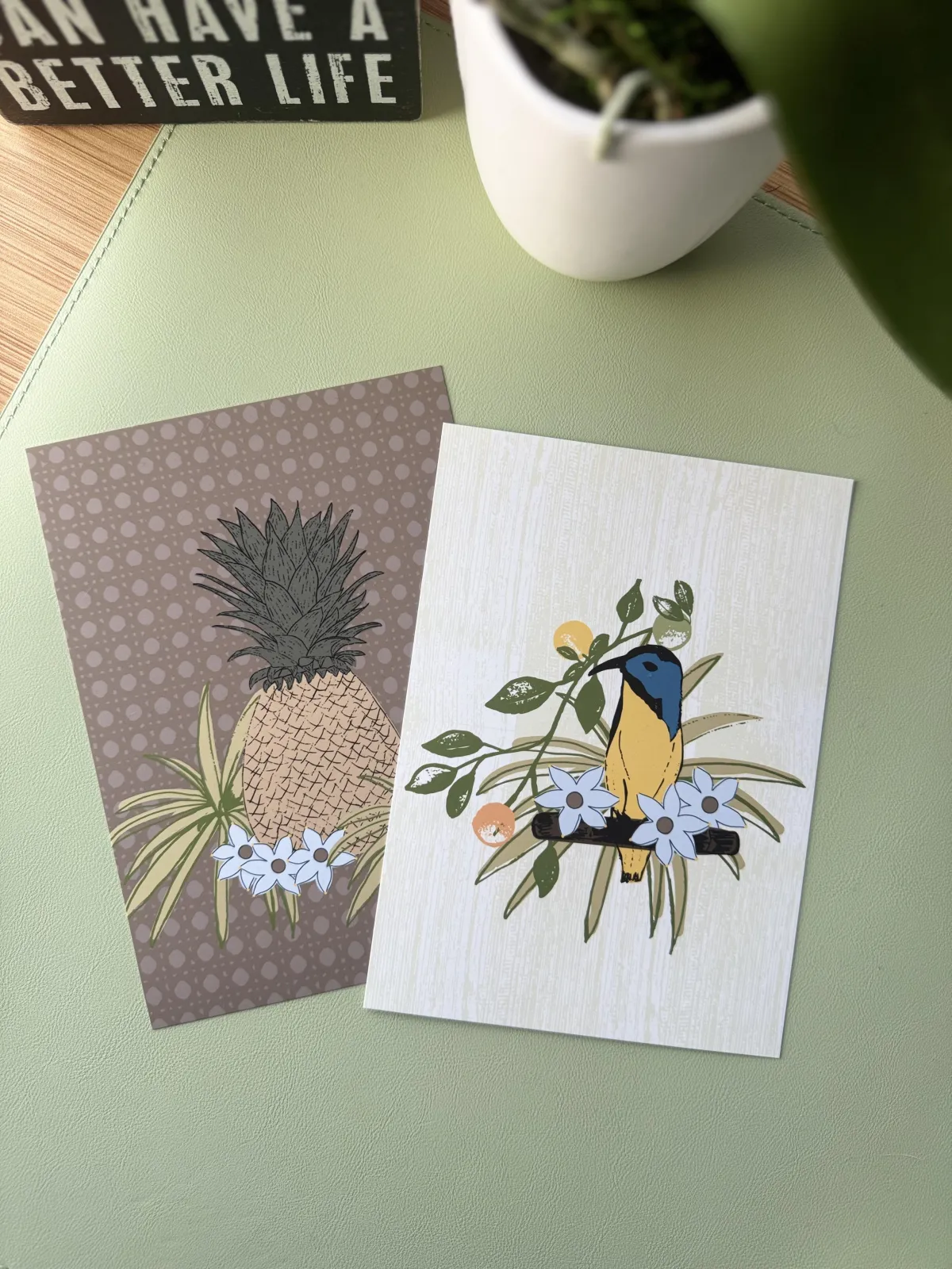 Filipino themed art pints of a pineapple and sunbird.