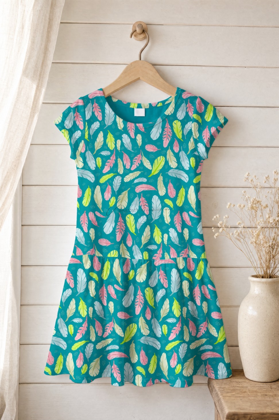 Girl's short-sleeved dress in the Feather Your Nest repeat pattern