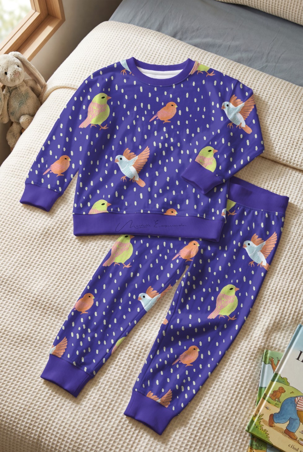 Toddler boy long-sleeved pajama set in the Fair Weather Friend bird repeat pattern