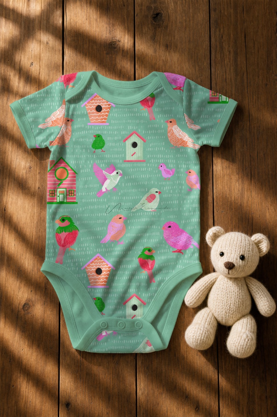 Baby onesie printed with the Home Tweet Home bird repeat pattern