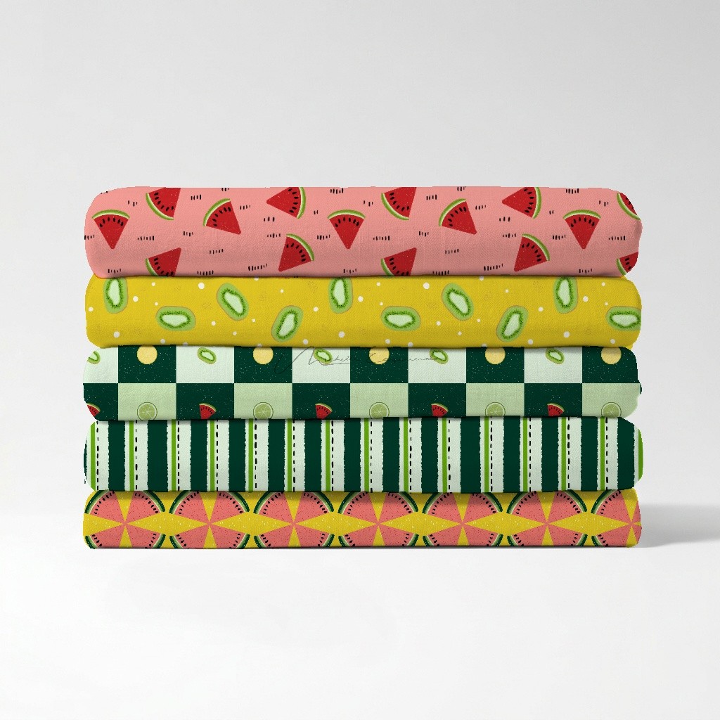 Stack of folded fabric swatches showing five repeat bird patterns from the Birds of a Feather surface pattern collection.