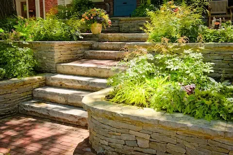 Stone retaining wall and garden steps built by Gresham Concrete Services in Gresham OR.