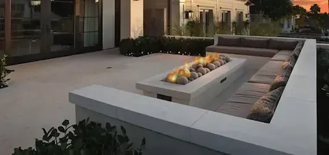 Modern concrete patio with built-in fire pit by Gresham Concrete Services in Gresham OR.