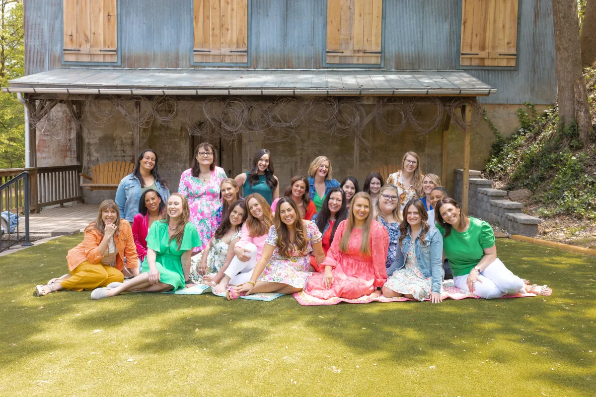 a group of women outside having drinks at Inspired Retreat