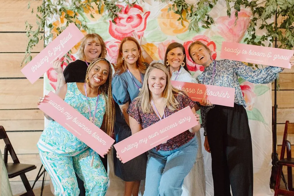 women at a live business event