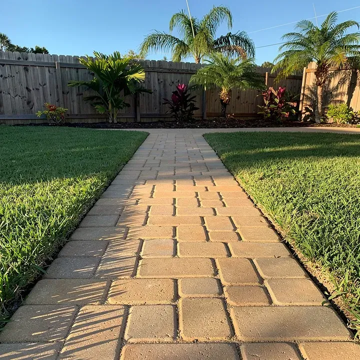 Small finished paver walkway section in a backyard in Kendale Lakes, Florida