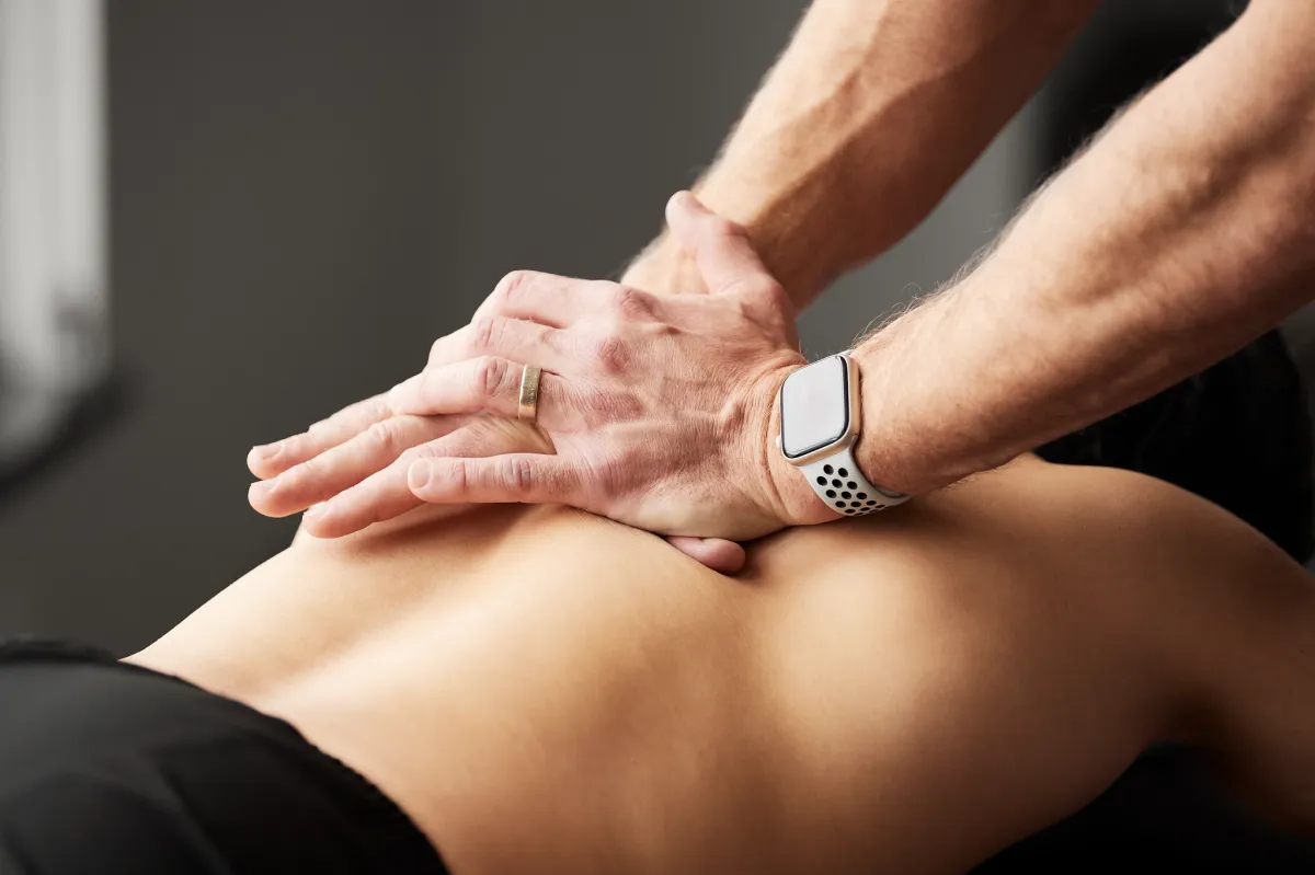 Image of a chiropractic clinic with a front desk and waiting area