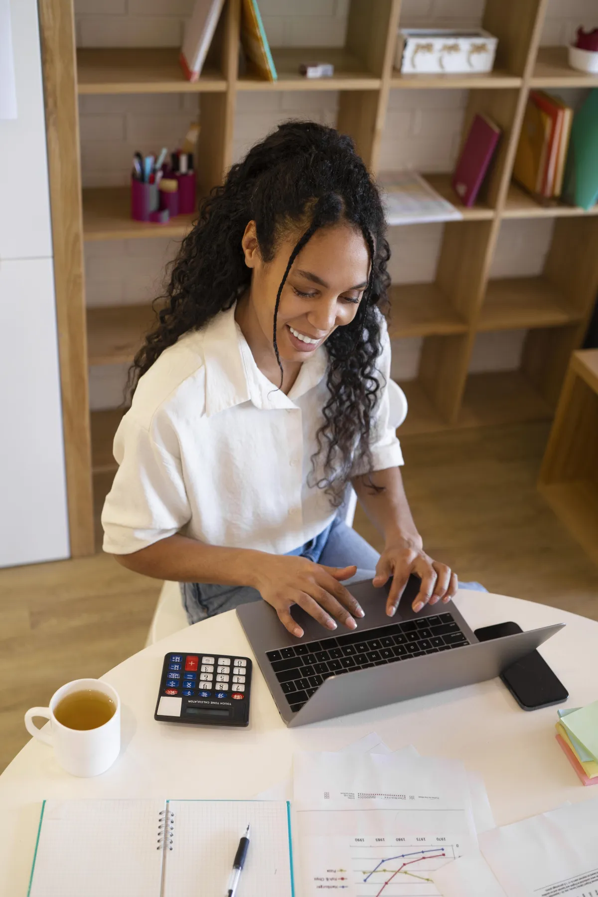Illustration image for the Best Decision Bookkeeping. Image of an individual working on their business bookkeeping and using their reports to make informed business decisions for their Kentucky business.
