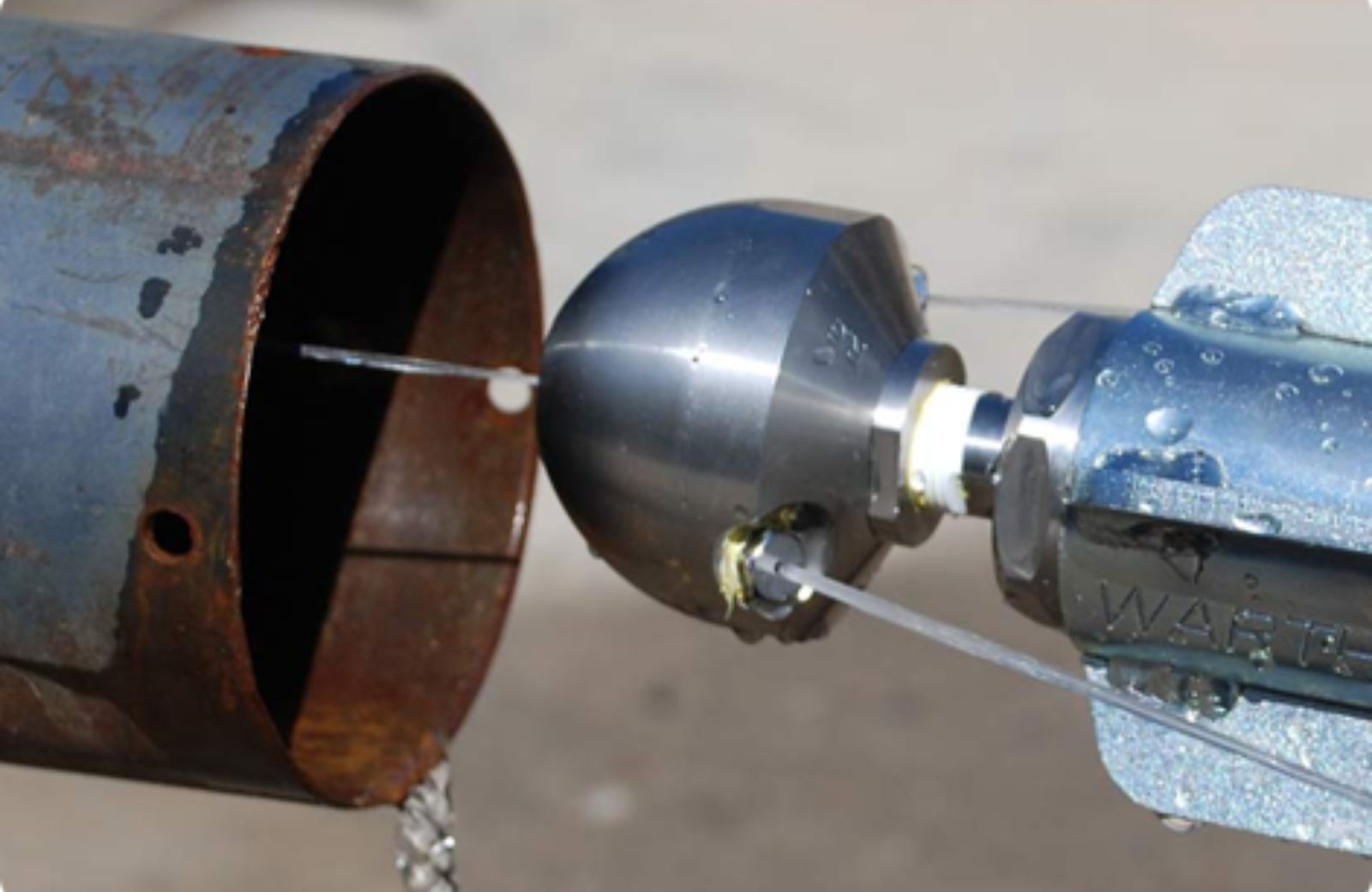 Houston drain and sewer line cleaning – high‑pressure hydro jetting equipment clearing debris from a corroded pipe