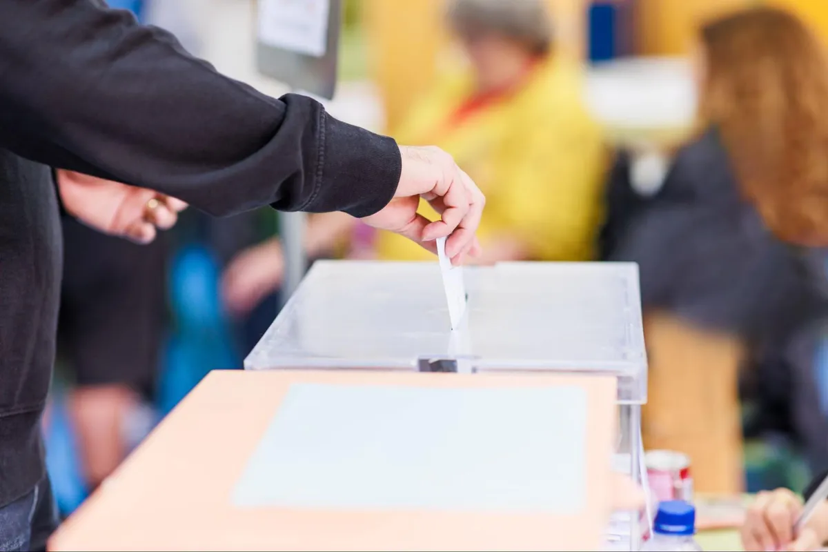 HOA board election with homeowners voting for community association leaders