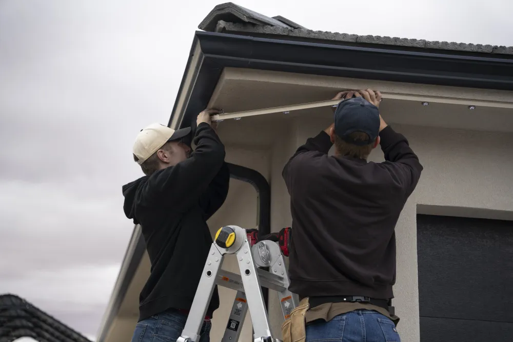Image of workrs installing permanent lighting