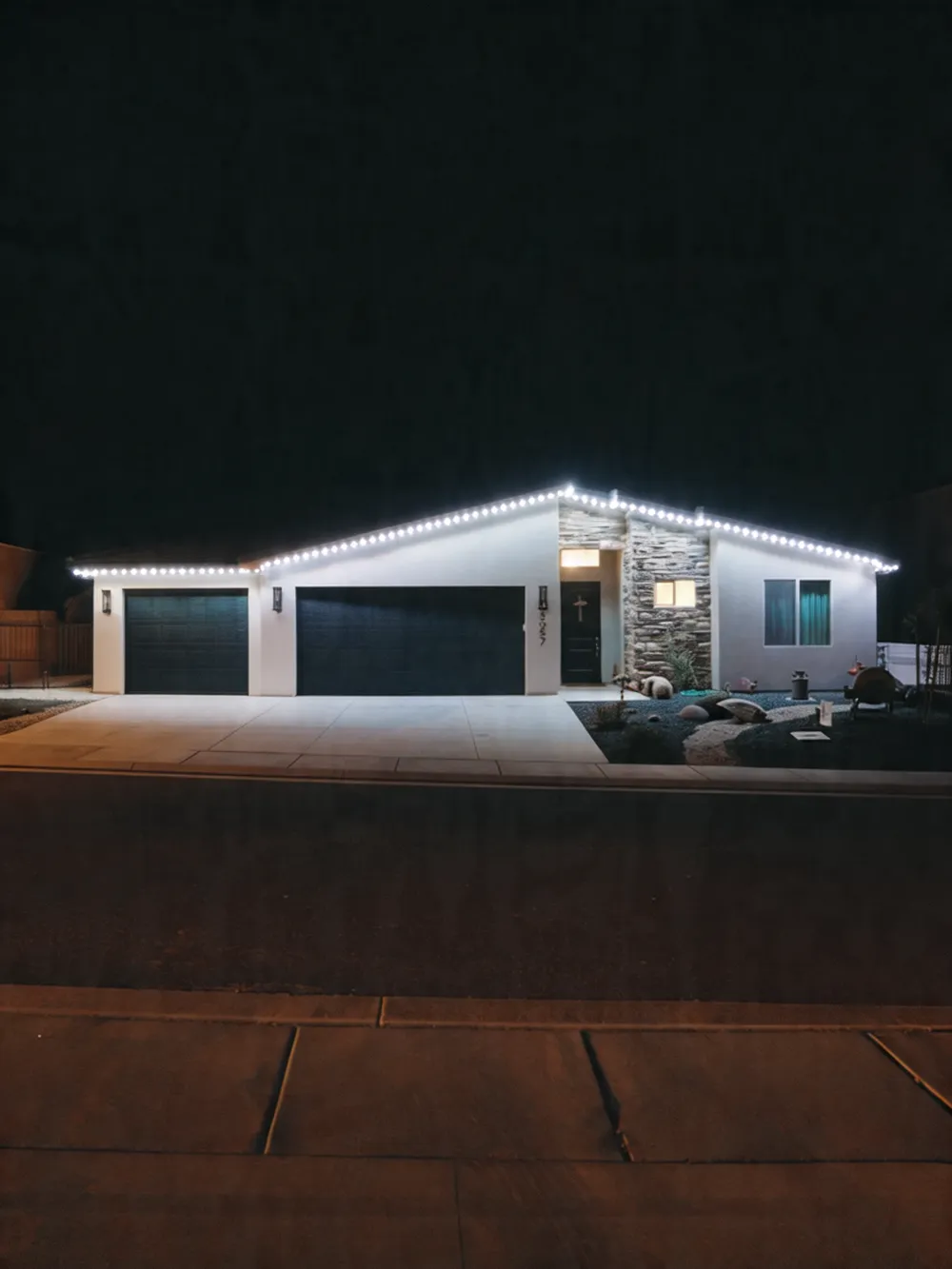 Image of Home at night with permenent lighting