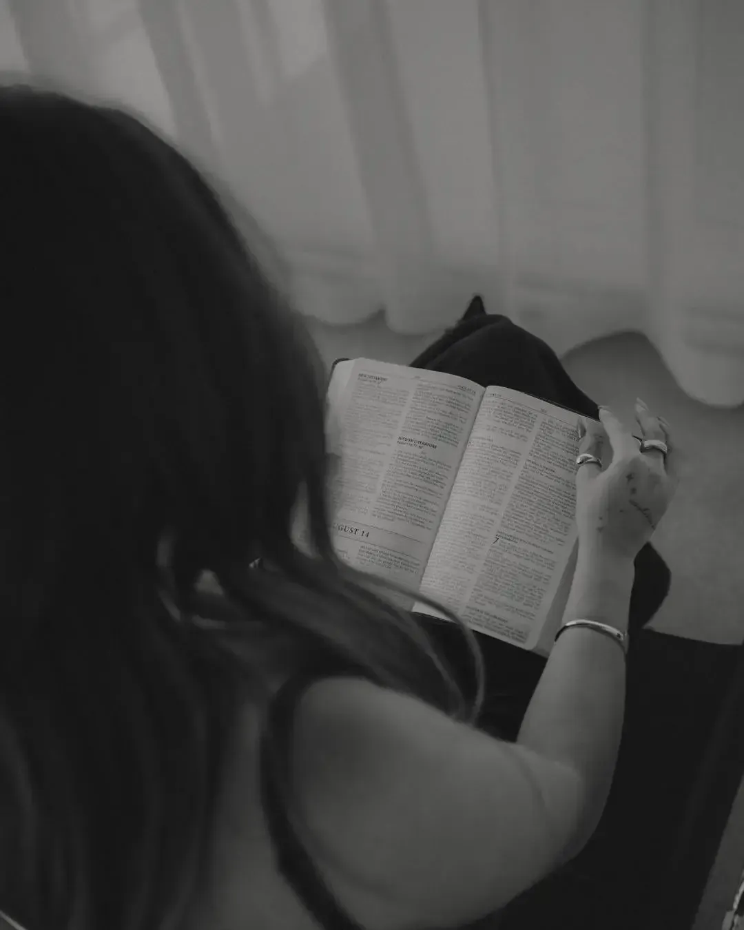 Chelsea Tansey reading a bible and sharing what's inside month 2. of her A-Players framework, illustrating her transformative coaching methodology for leadership development
