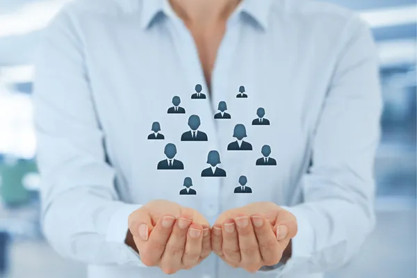 Person holding icons representing clients, symbolizing personalized home inspection service in Orlando, FL.