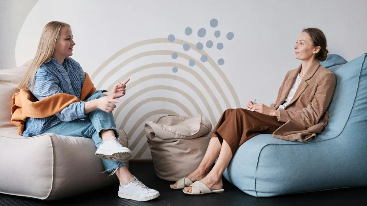 silver and black round analog watch