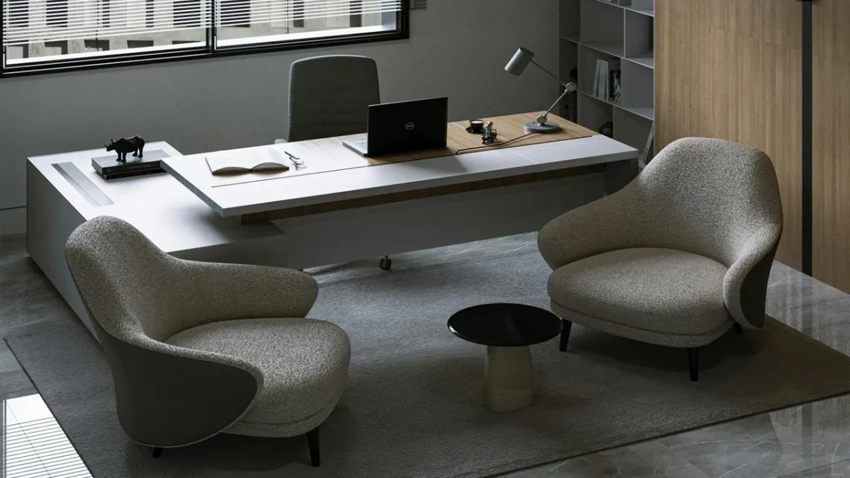 A large body of water sitting next to a rocky shore