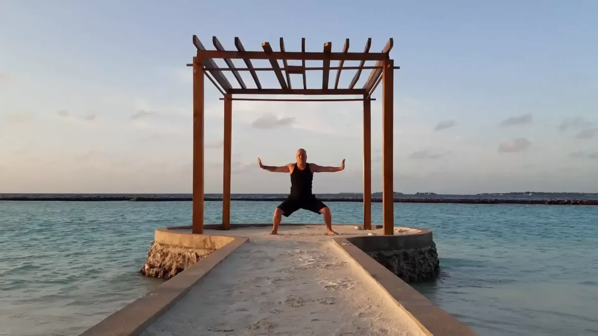 Peter practising horse stance in the Maldives