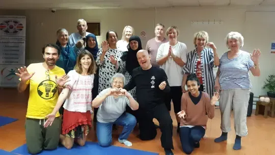 Picture shows a group training with Peter showing Qi Gong is for everyone at the Bright Beings Academy
