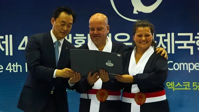 Peter Paul Parker receiving Qi Gong champions award in Korea