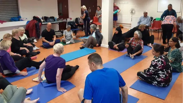 Peter speaking to Qi Gong class at New Malden