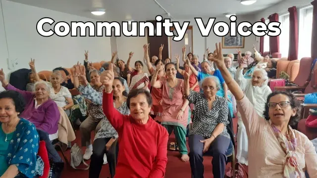Peter getting feedbac from his community Qi Gong class