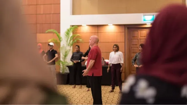 Peter teaching qi gong at the IWEE event in the Maldives