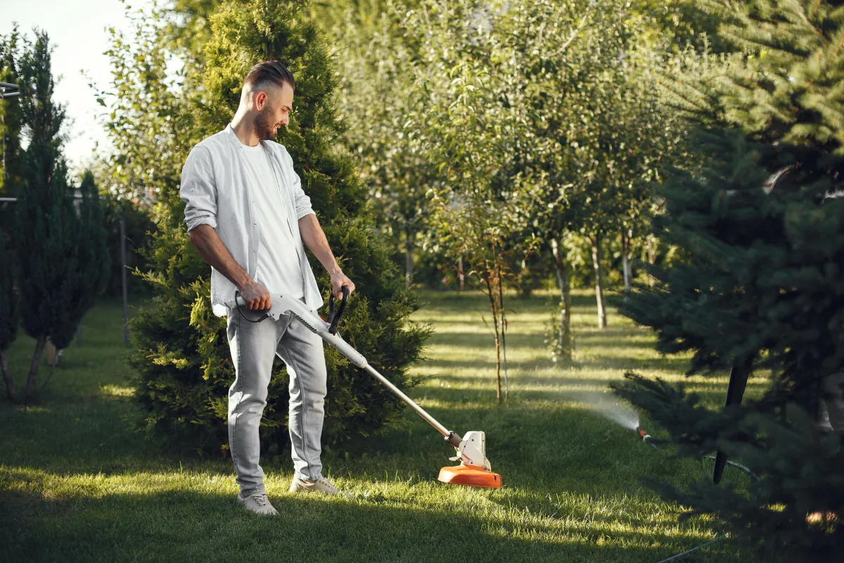 Man weed eating