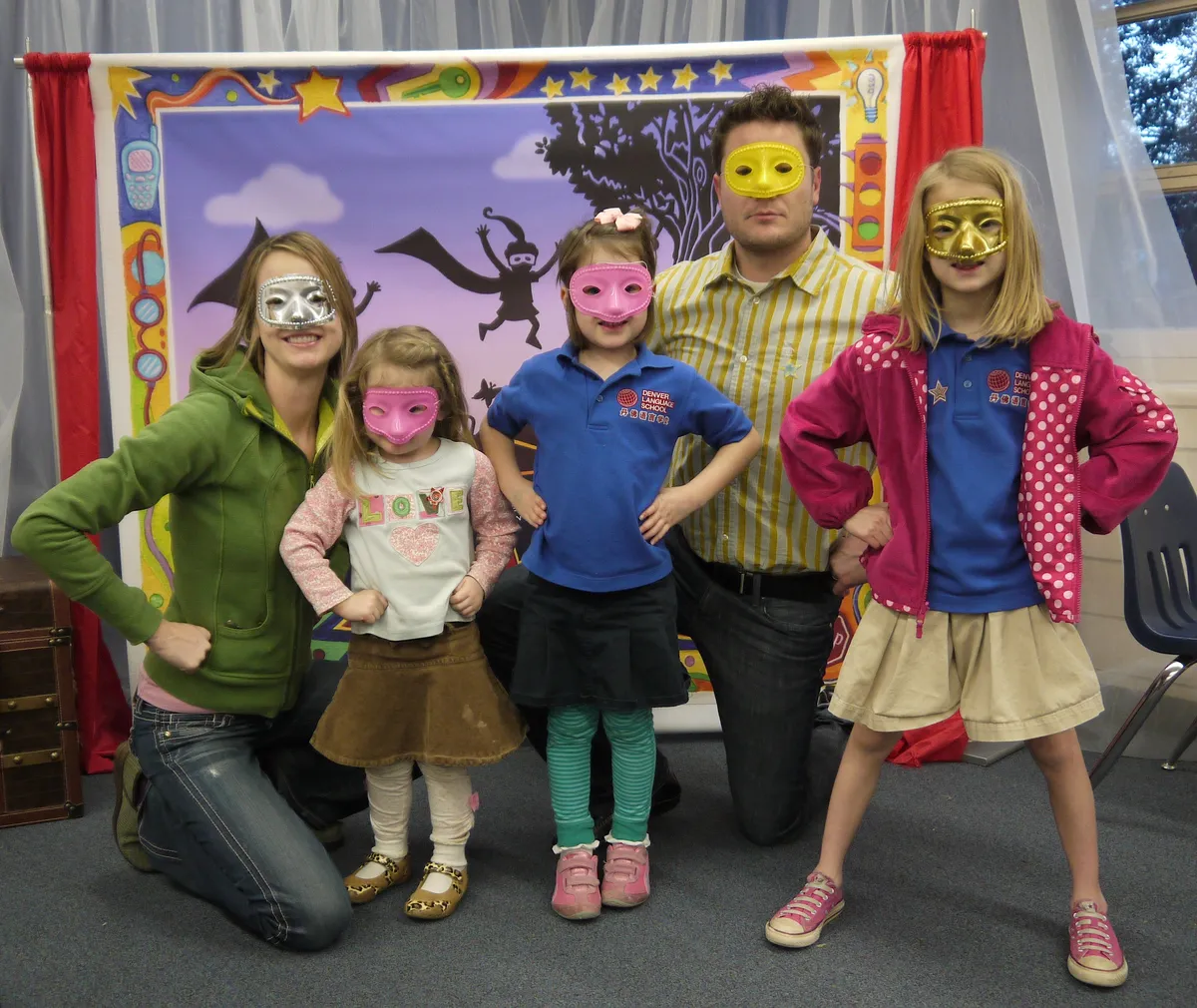 Children in homemade hero masks with Diana