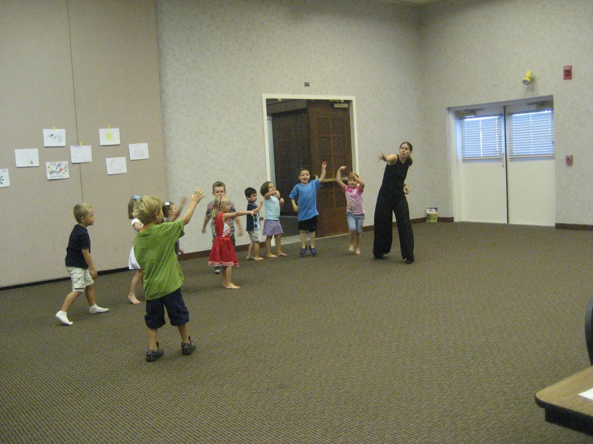 Kids moving and playing during an HLC session