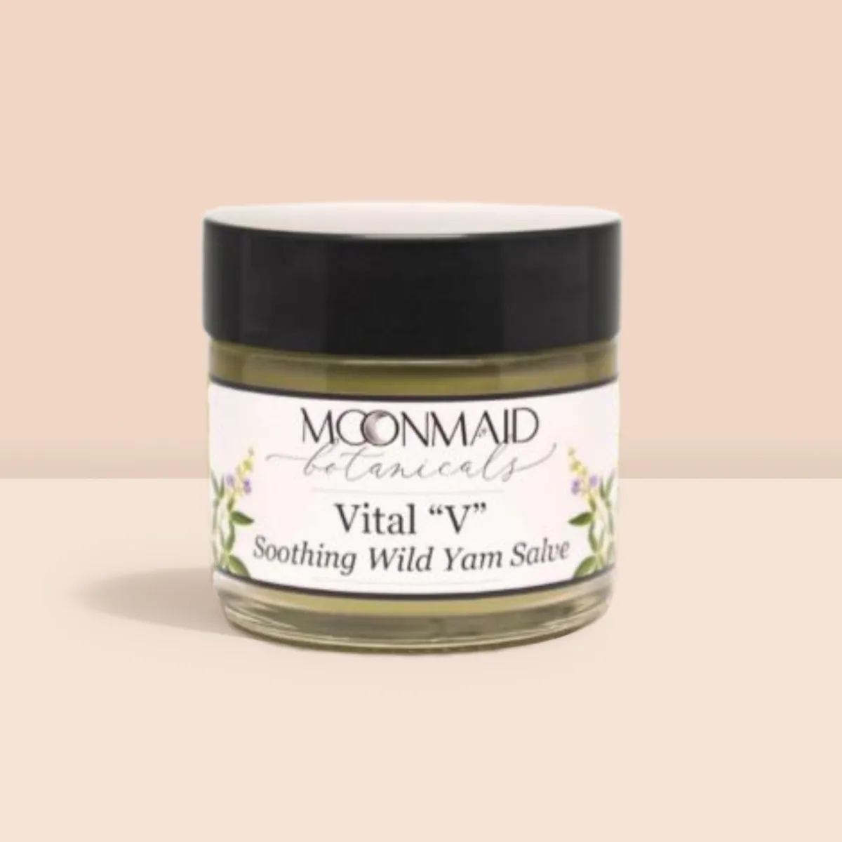 A jar of Vital 'V' Soothing Wild Yam Salve, featuring its label prominently displayed against a simple background.