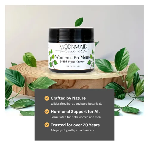 Jar of Women's Moonmaid Wild Yam Cream on a log slice, surrounded by leaves, with text about natural crafting and hormone support for over 20 years.