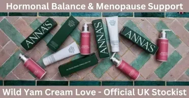 An assortment of Anna’s Wild Yam Cream boxes and pink magnesium spray bottles scattered across a green and pink tiled surface, featuring the text 'Hormonal Balance & Menopause Support - Official UK Stockist.