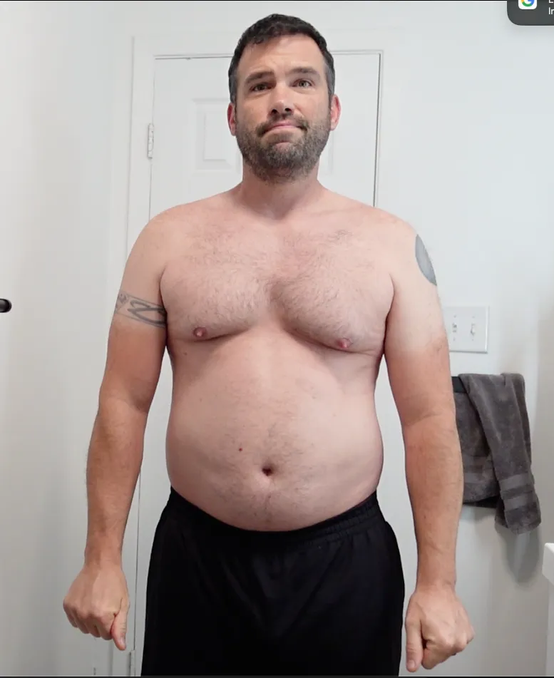 The starting 'before' photo of Genesis Method founder Don-E Harris, showing his physique prior to his 10-week transformation.