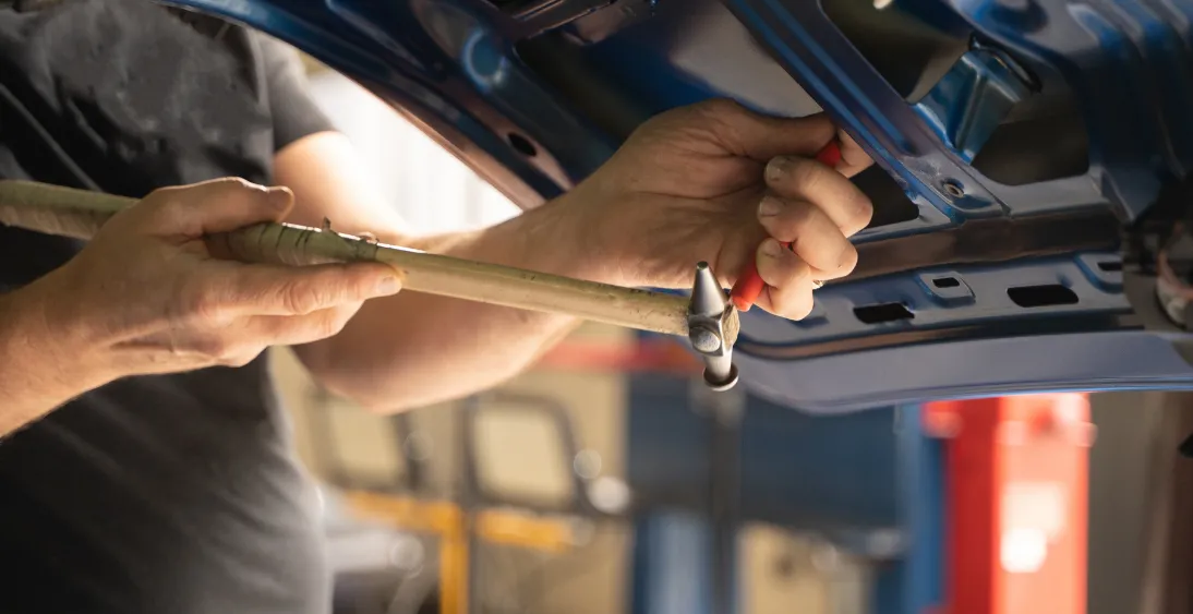 Removing dent from inside the trunk