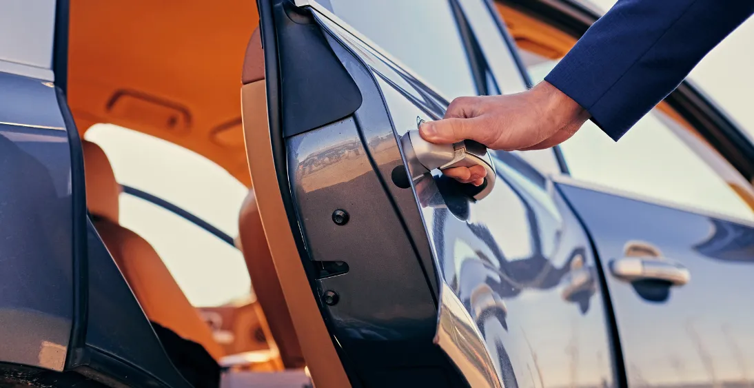dent in side panel of work car
