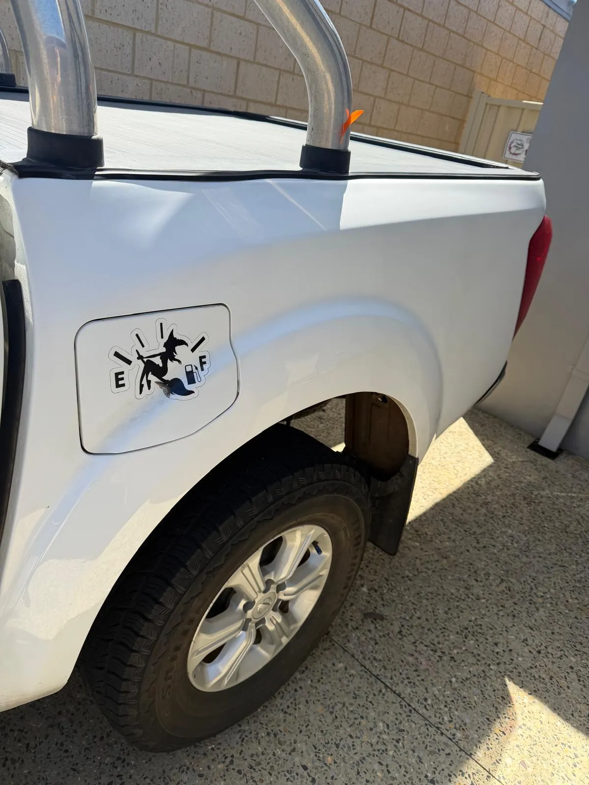 White ute with scfuff marks removed with buffing