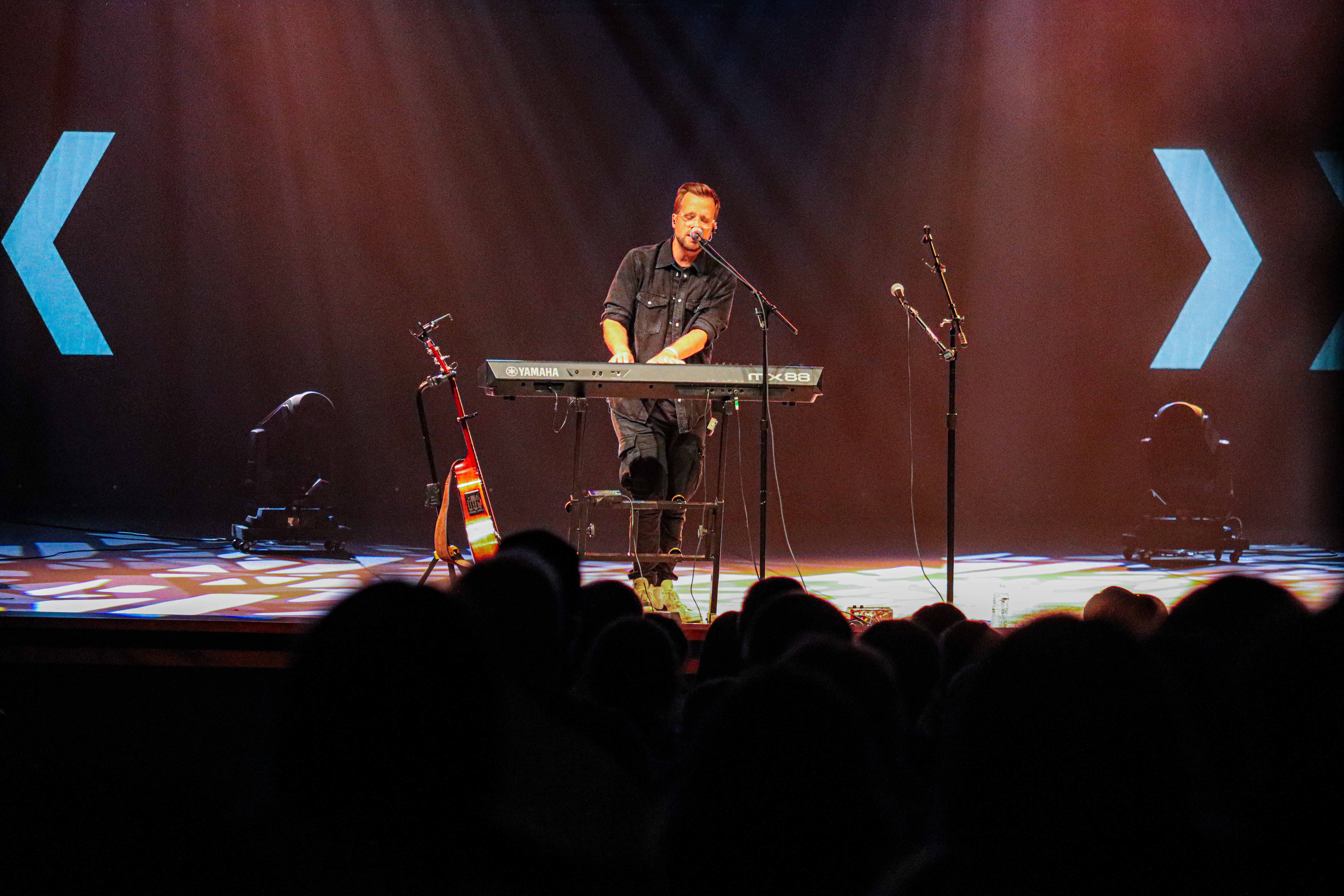 Josh Wilson live at a church concert.
