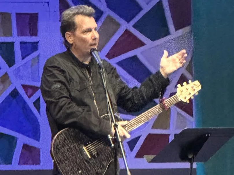 Mark Lee of Third Day is speaking to a church crowd during a recent solo Performance.