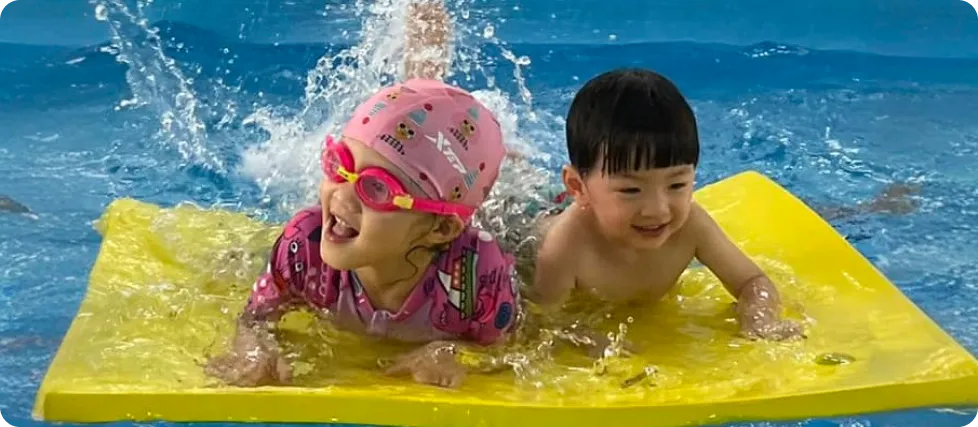 Kids learning swimming in warm water pool Bukit Mertajam