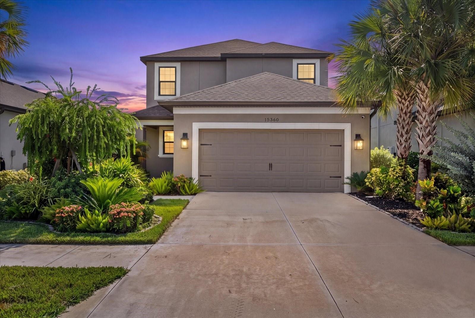 Luxury exterior real estate frame for 15360 Isla Palma Lane