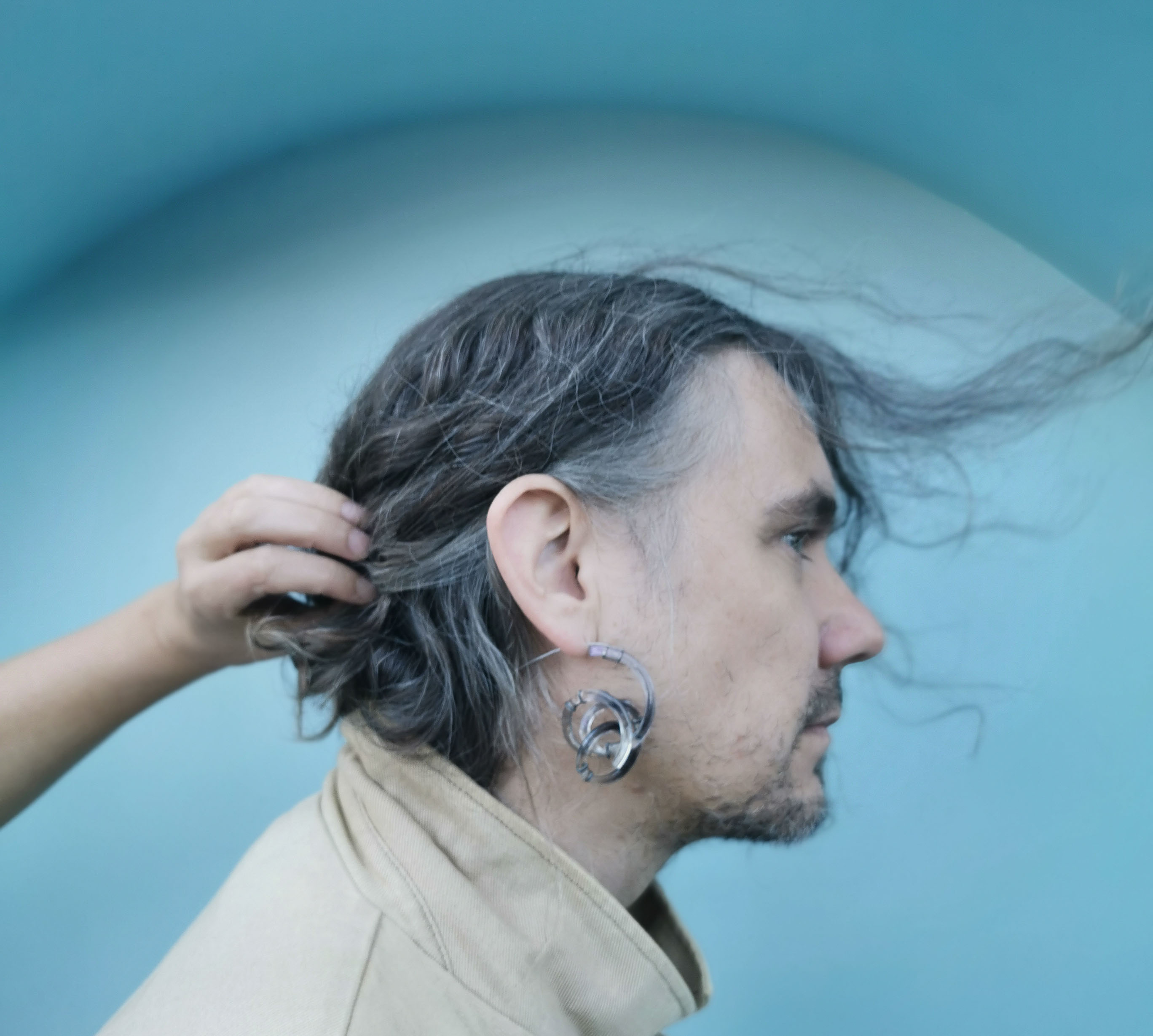 side portrait with earring