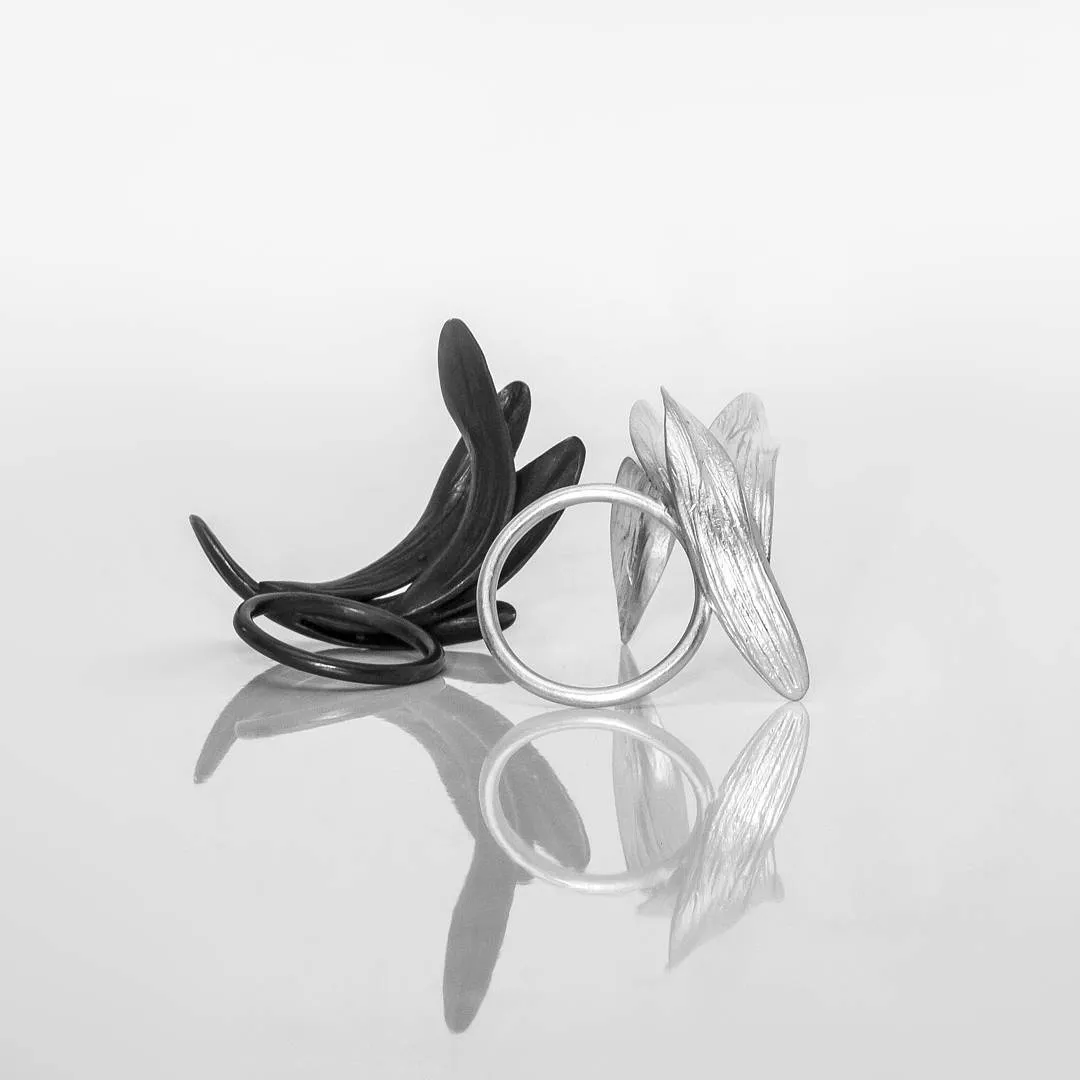 black and silver feather rings