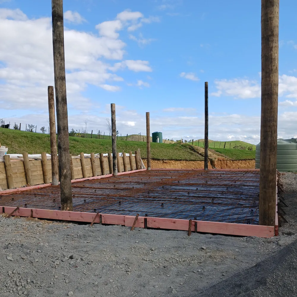 Rural concrete feedpad for farm machinery